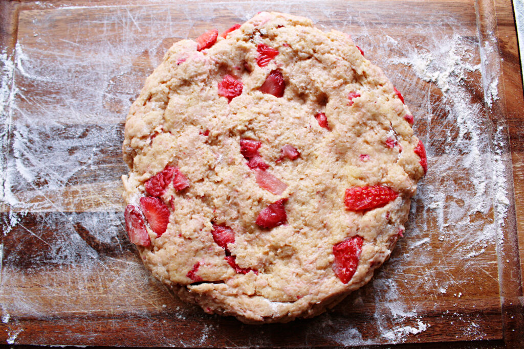 Strawberry Scone dough formed into a disk.
