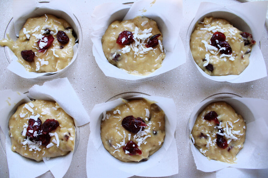 sourdough discard muffin dough with cranberry and coconut