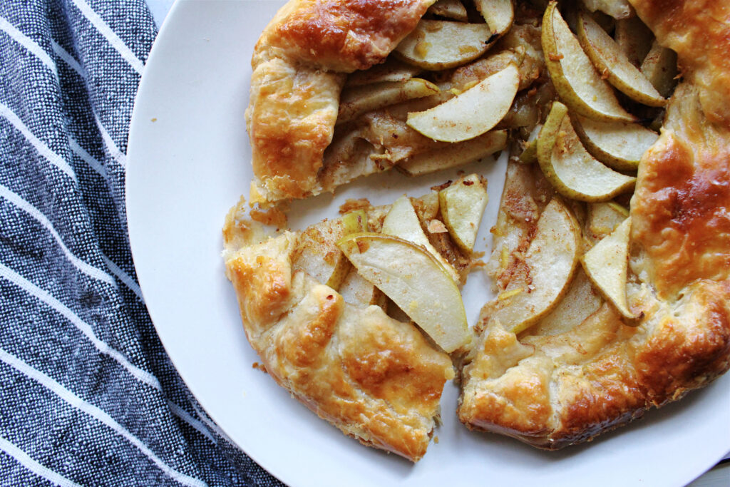 Simple pear and ginger galette with a golden flaky crust.