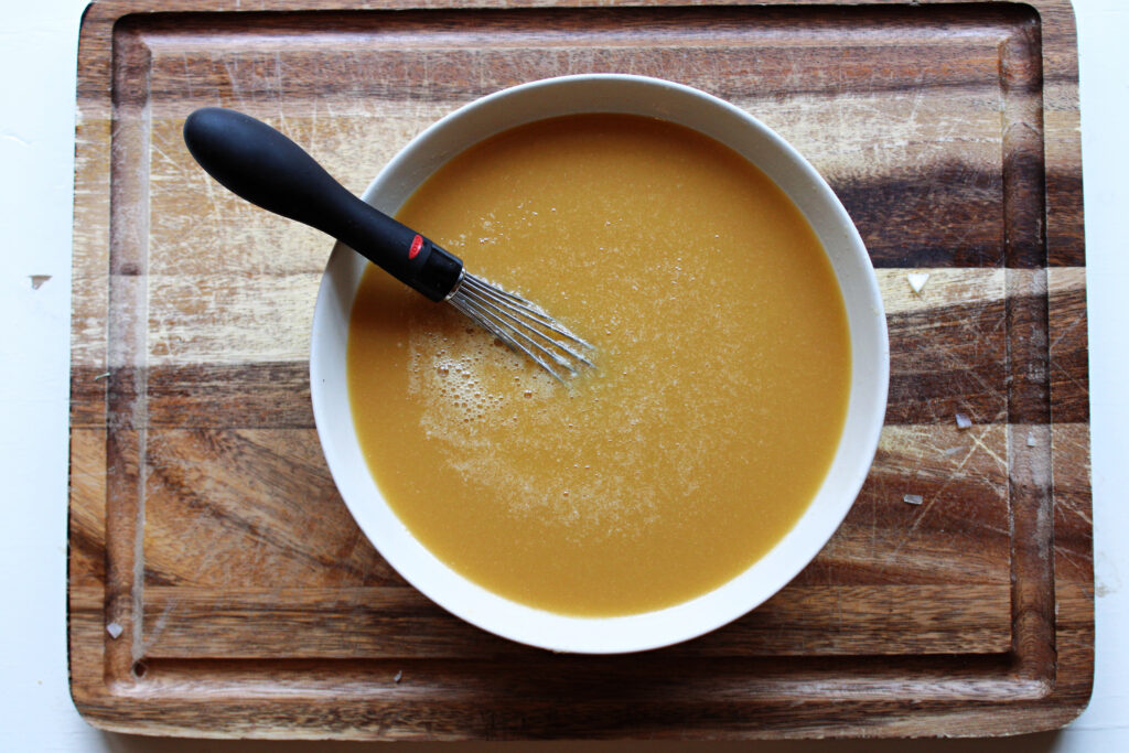 Overhead of the butter, broth, and eggs for the easy sourdough stuffing recipe.