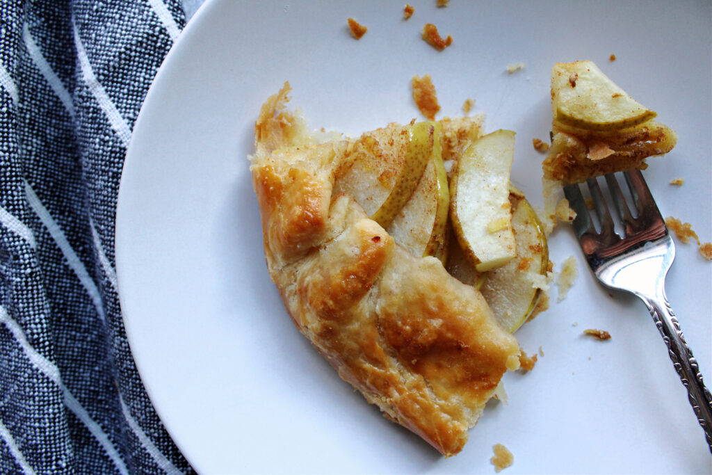 overhead of simple pear and ginger galette slice.