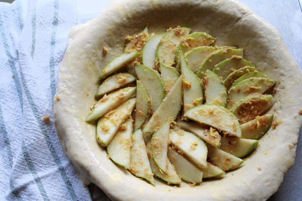 Close up of the pear and ginger galette filling in the pie crust.
