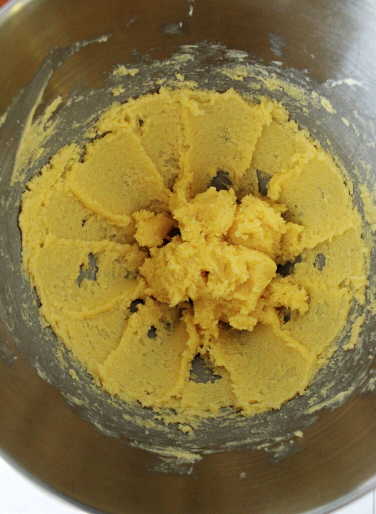 creamed butter in a mixing bowl.