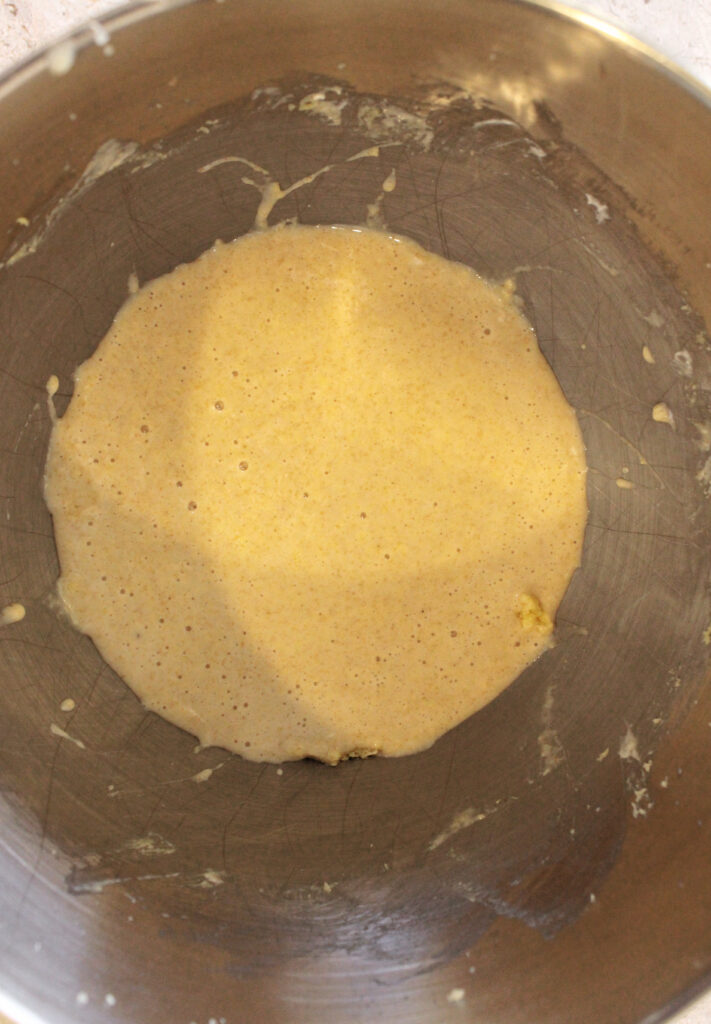 Wet ingredients for the sourdough cupcakes in a mixing bowl.