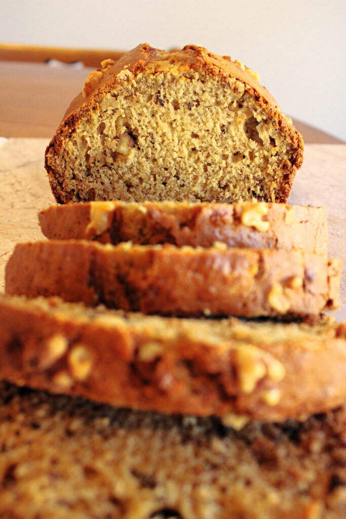 Banana bread on a cutting board.