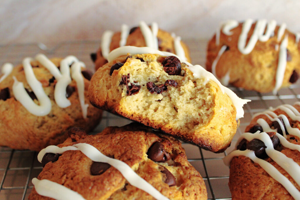 Classic chocolate chip sourdough scones on a cooling rack.