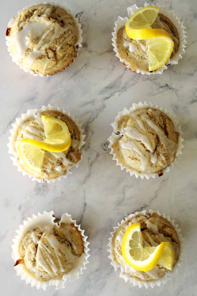sourdough discard lemon poppy seed muffins with lemon glaze.