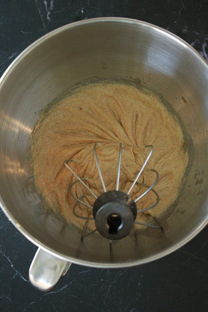 Wet ingredients mixed in a bowl for the Halloween Monster Ice Cream Sandwiches.
