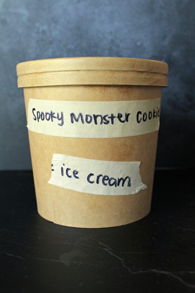Leftover ice cream and cookies stored in a paper storage ice cream container.