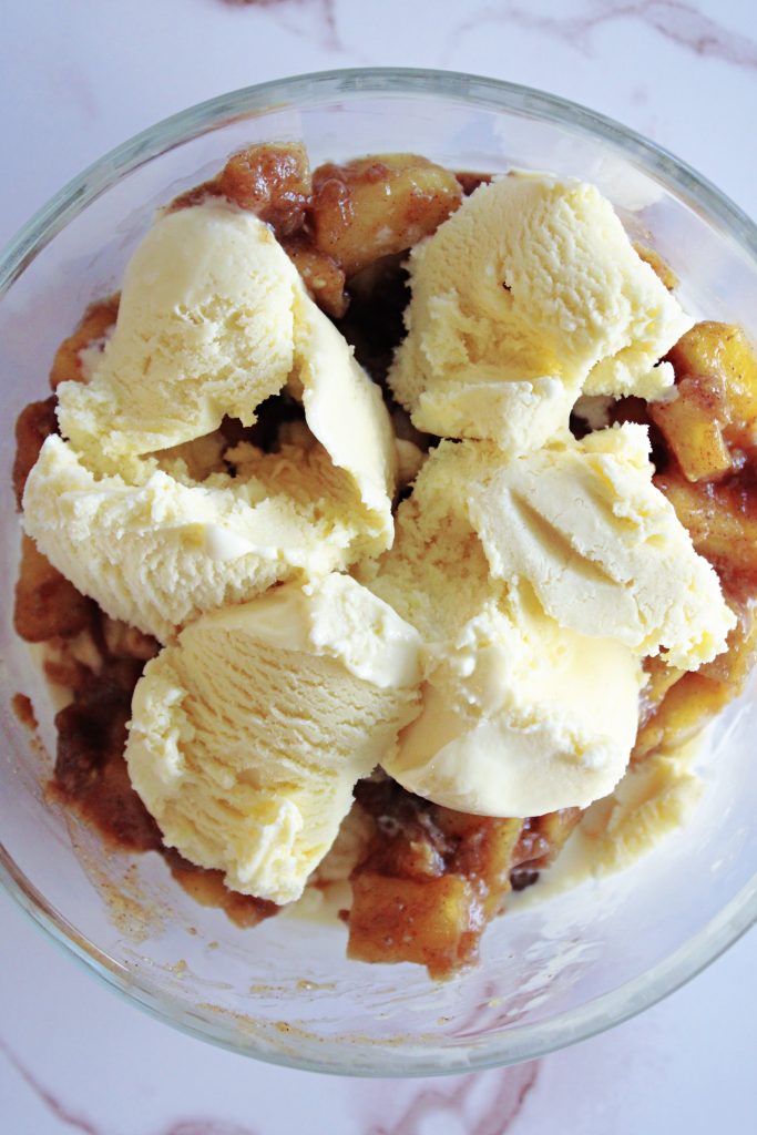 Close up of the best apple pie ice cream in a bowl.