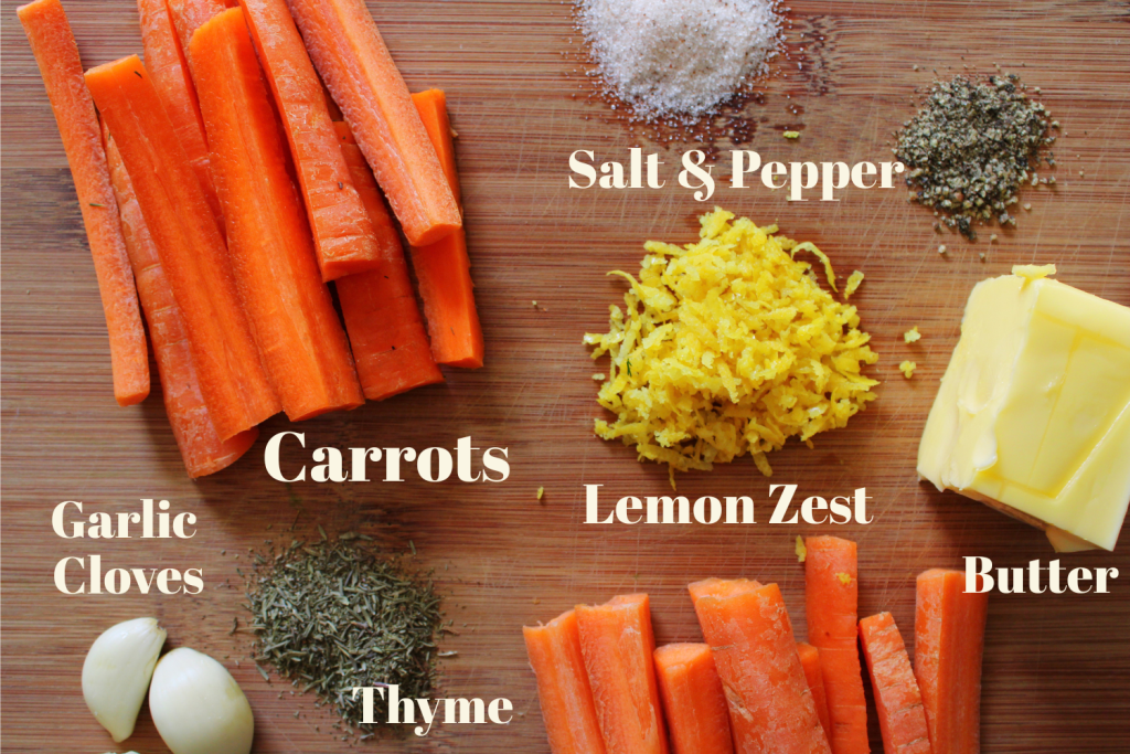  Ingredients for The Best Oven Roasted Carrots with Lemon and Thyme laying on a cutting board.