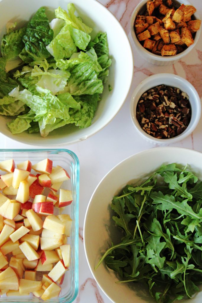 Autumn Harvest Salad with Apples and Sweet Potatoes Ingredients on the table.