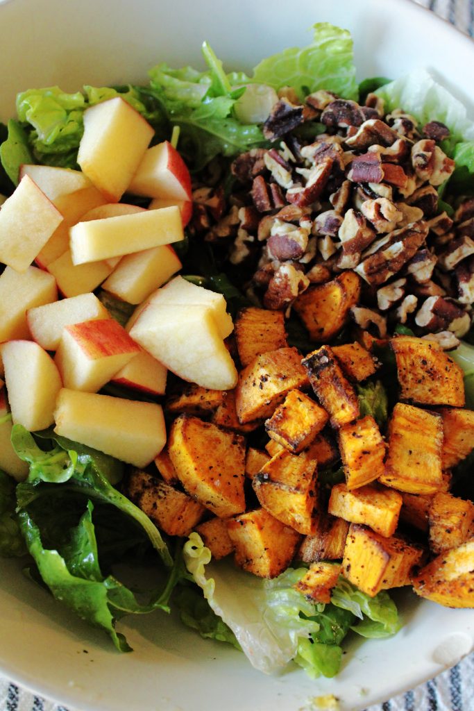 A close up picture of the Autumn Harvest Salad with Apples and Sweet Potatoes.
