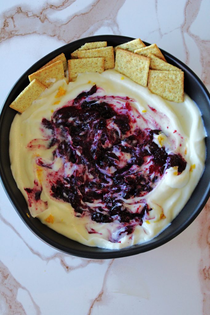 Holiday Cranberry Orange Whipped Ricotta with the cranberry jam mixed through the ricotta.